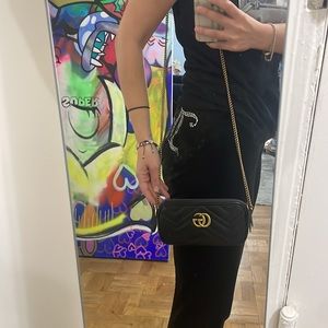 Gucci bag with chain strap.